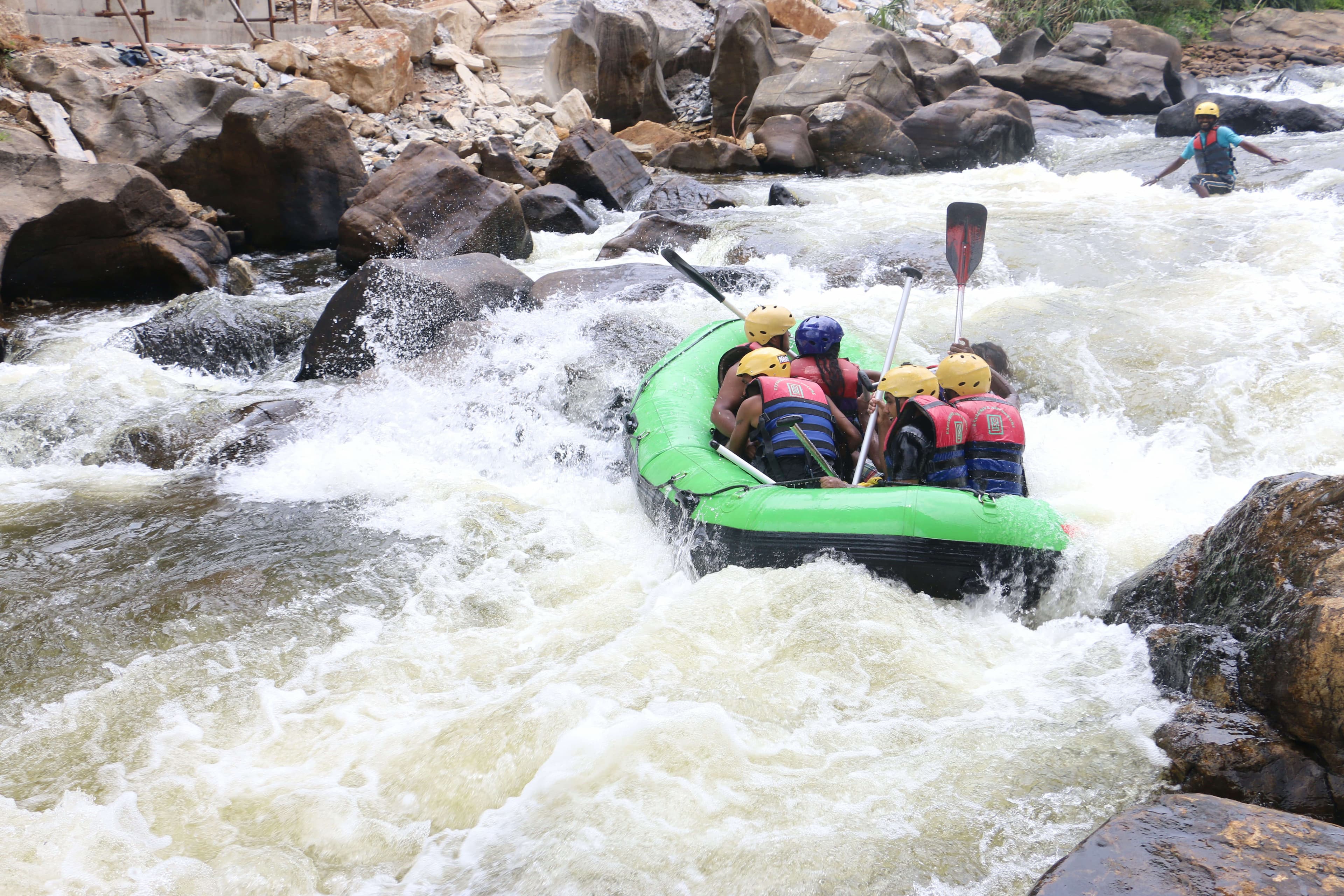 The tourists do rafting at the first day of camping in Kithulgala in Sri Lanka