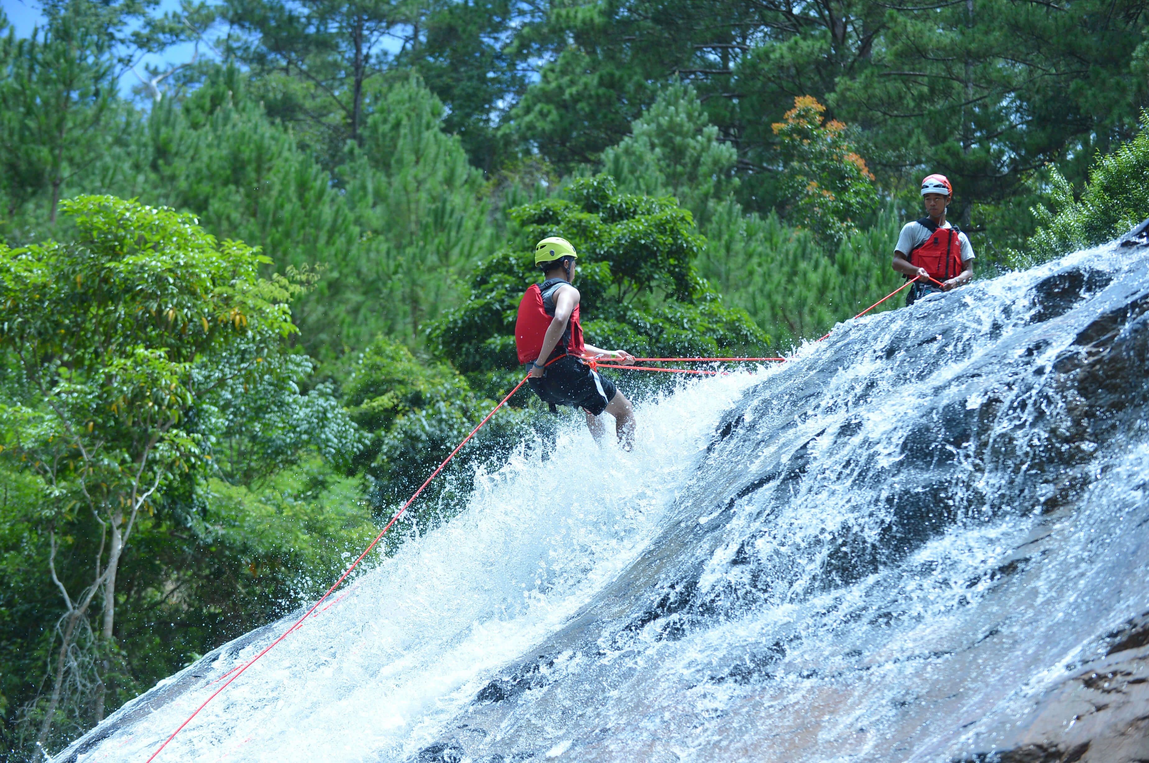 The tourist do abseiling in the second day of camping in Kithulgala Sri Lanka