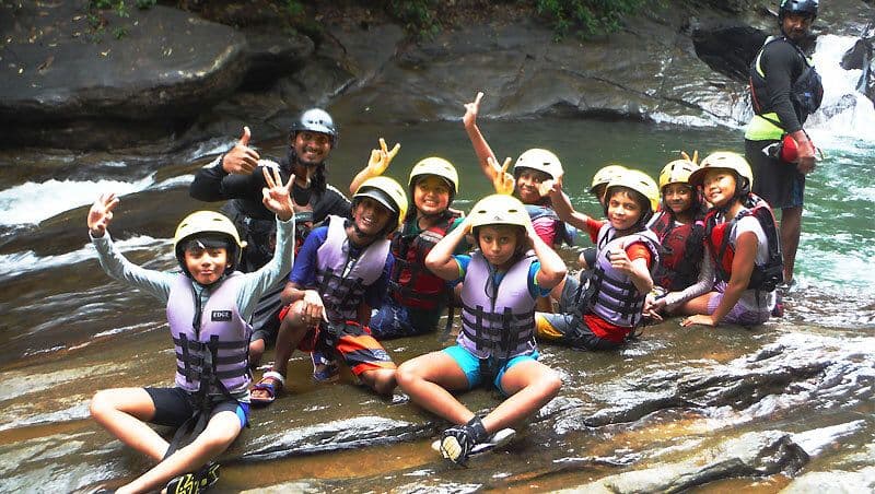 The children do safety canyoning with well experienced guide in Kithulgala Sri Lanka