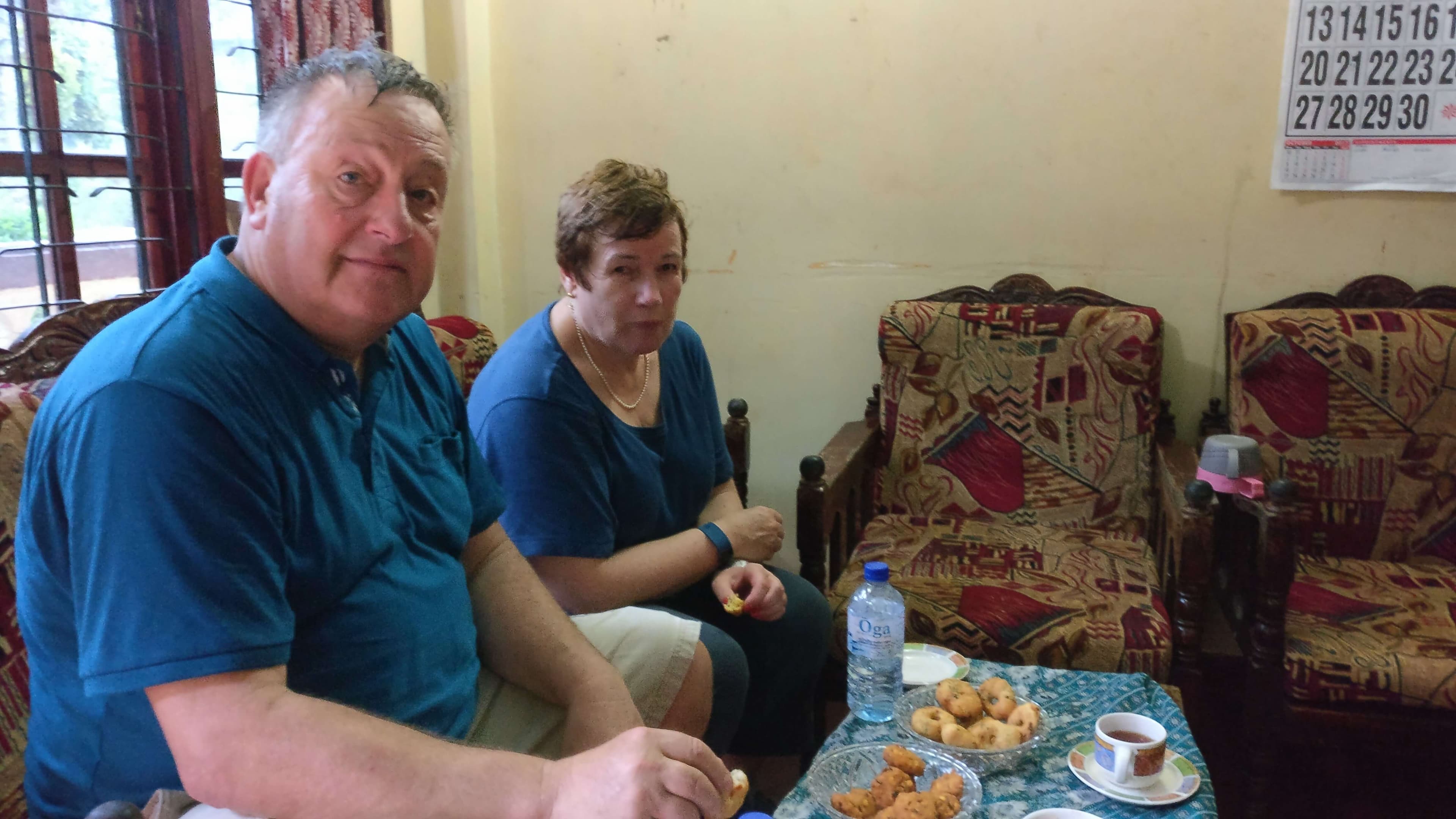 Tourists visit “Line-houses” taste traditional snack with hot tea in Kandy Sri Lanka