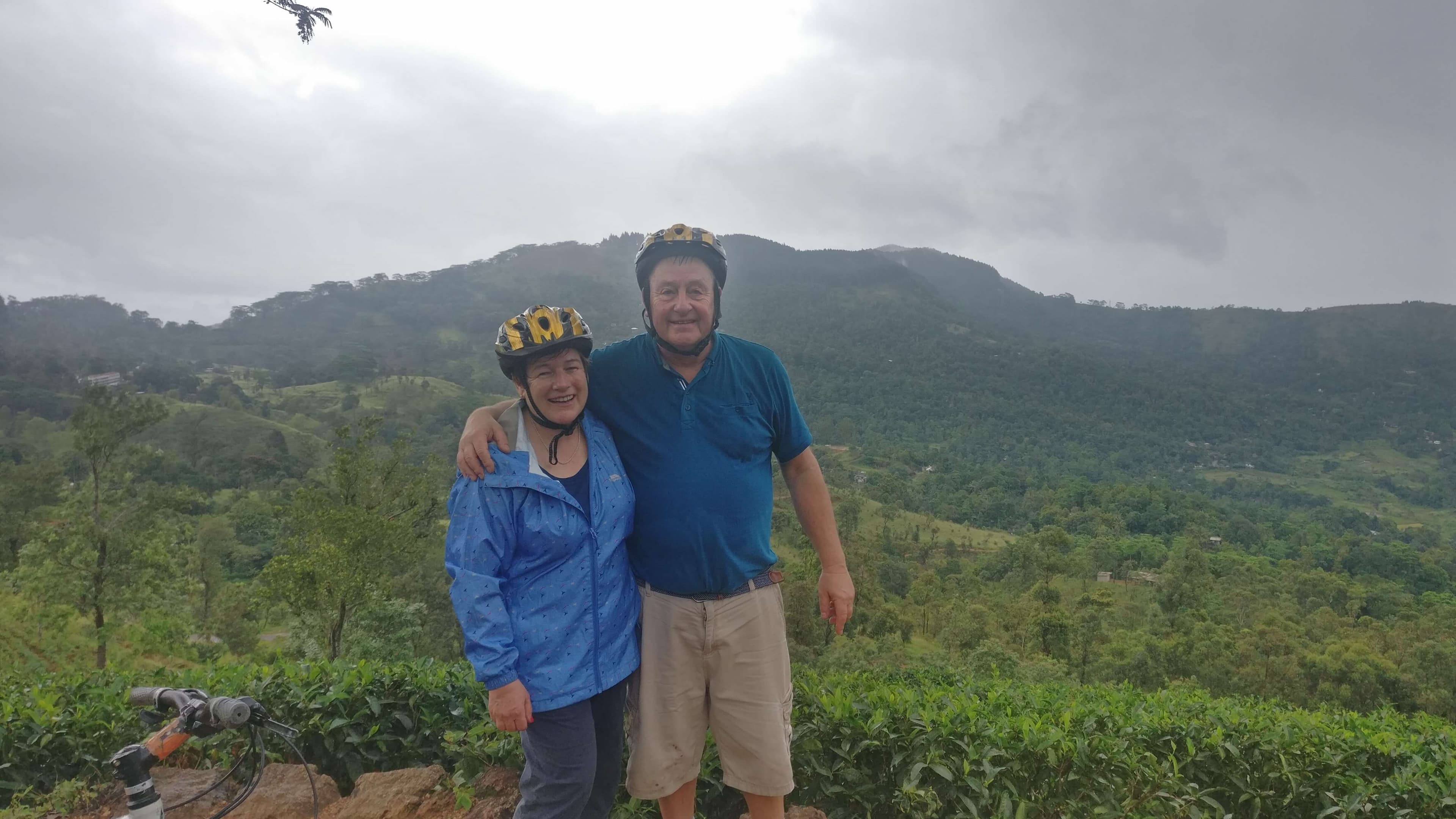 The cyclists take photo in the beautiful tea State in Sri Lanka