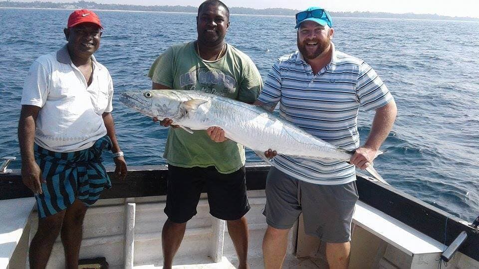 The happy moment of catch fish with well experienced guidance of the guide in Negombo