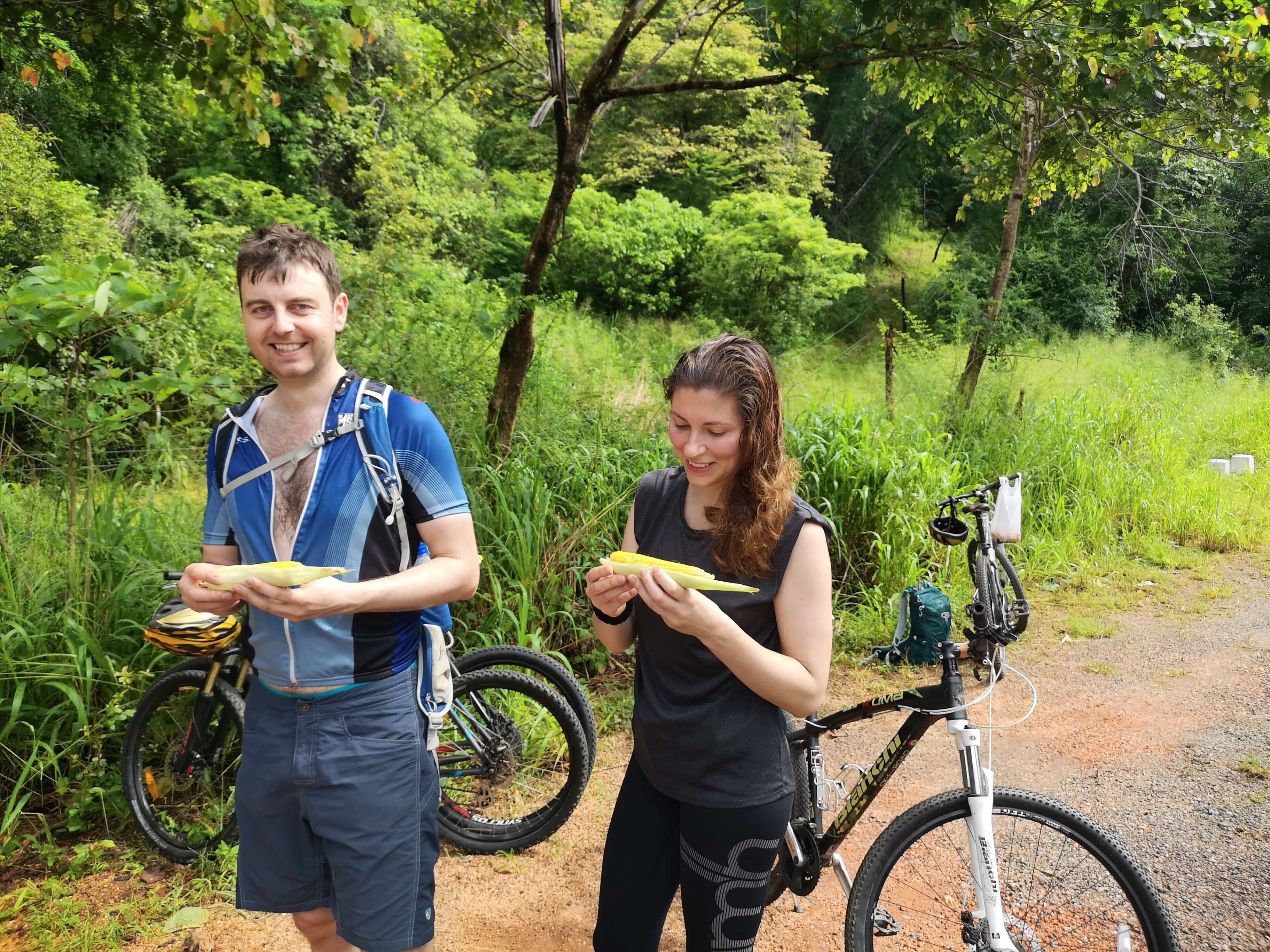 Couple of cyclists enjoining the Kandy to Sigiriya cycle tour in Sri Lanka