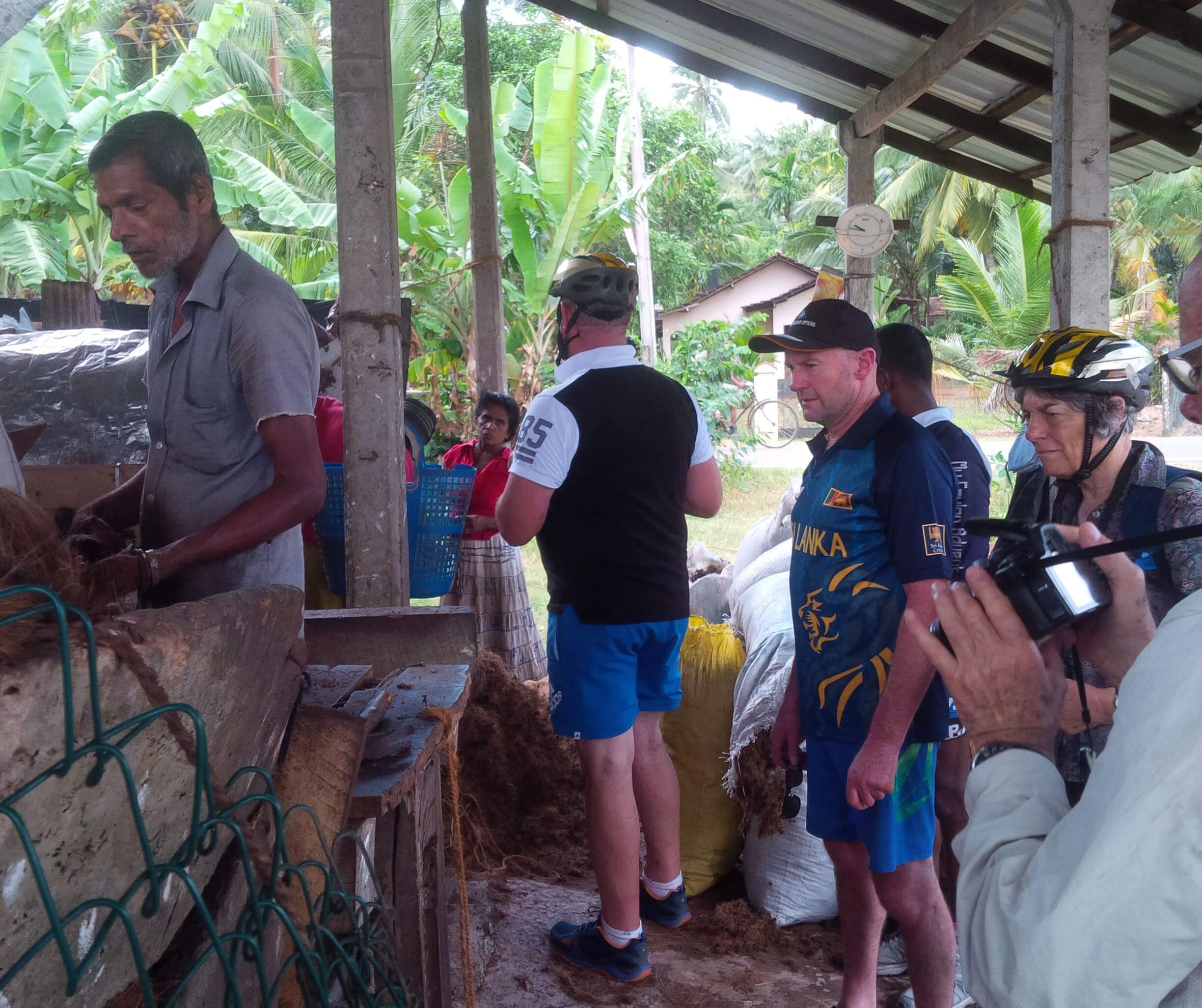 The tourists explore Local alcohol making process in Negombo Sri Lanka