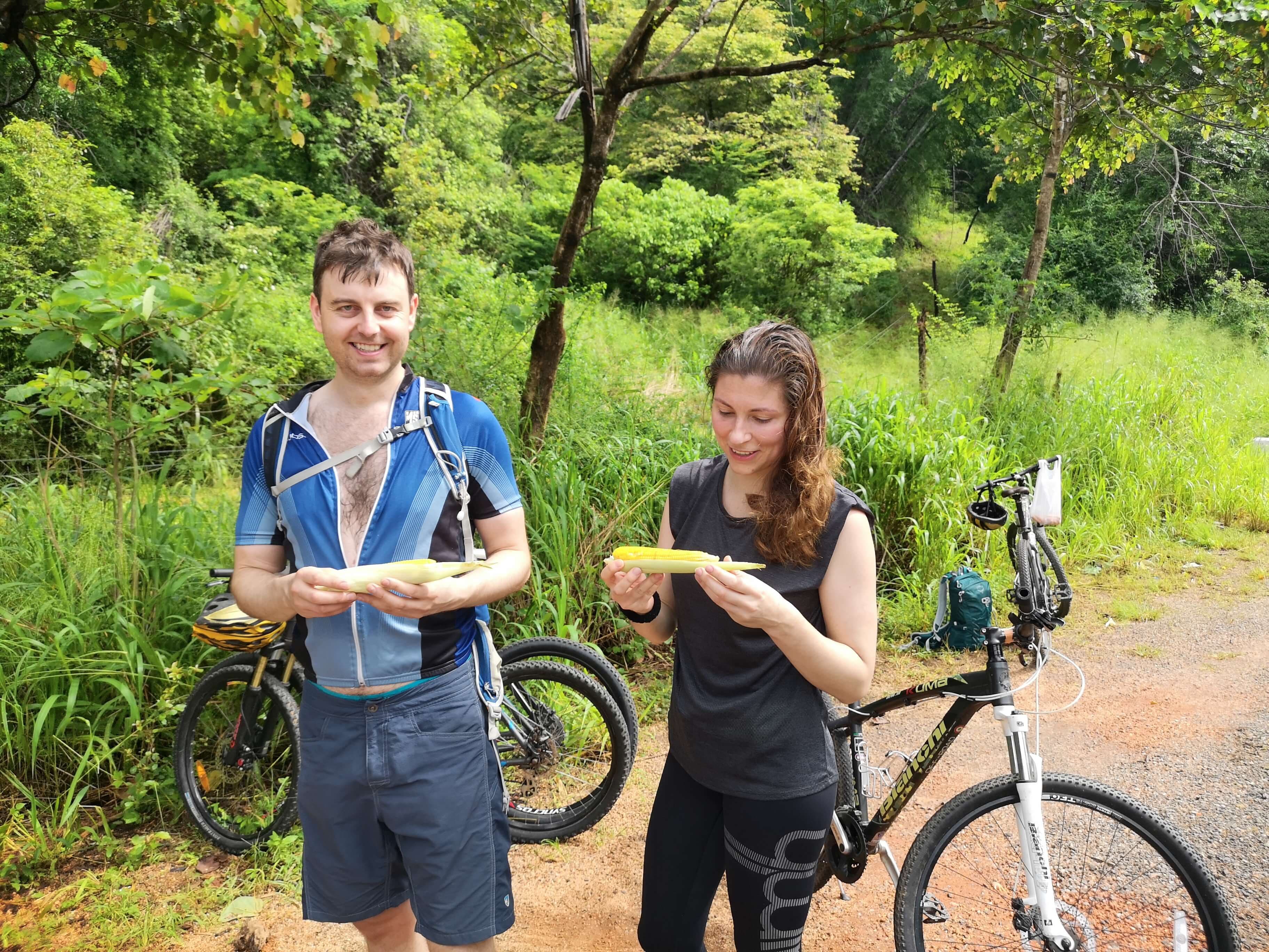 Couple of cyclists enjoining the Sigiriya to Polonnaruwa cycle tour in Sri Lanka