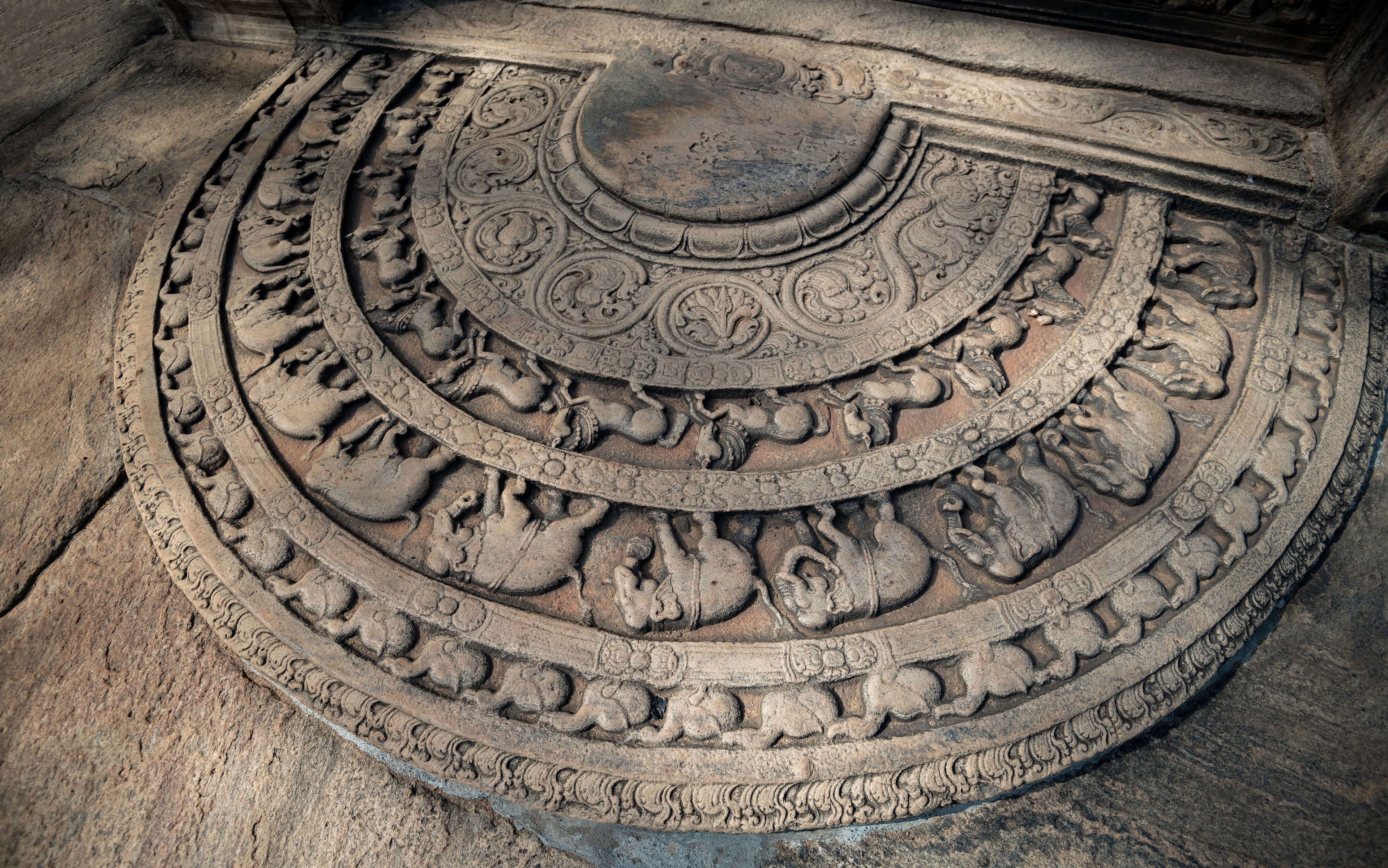 A picture of the Plonnaruwa moonstone in the ruin city of Polonnaruwa Sri Lanka