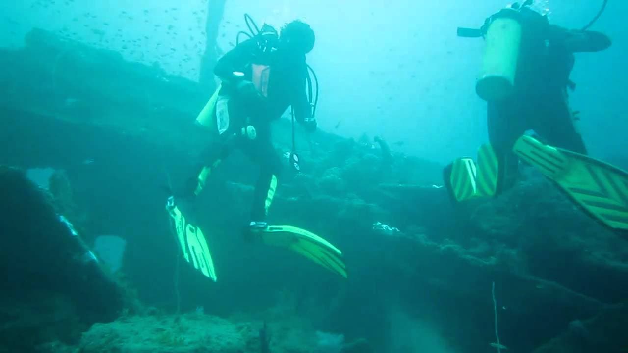 A view of two divers explore the Ralagala wrek in Sri Lanka