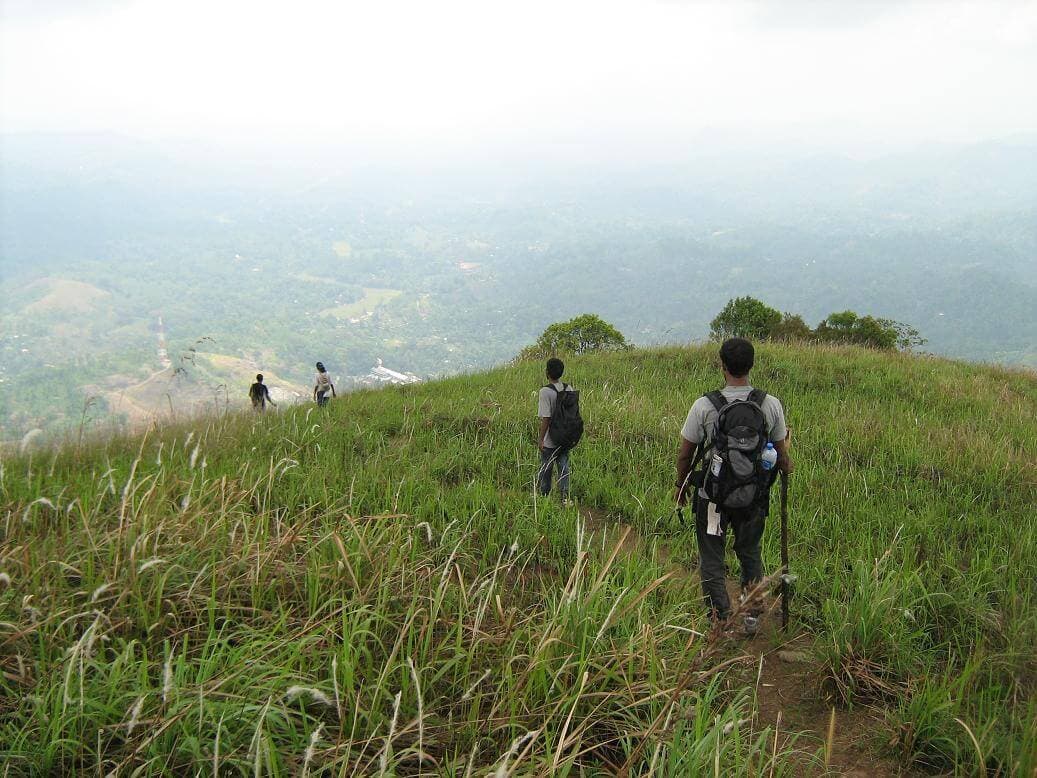 The tourists trekking on the Kandy Alagalla mountain Sri Lanka