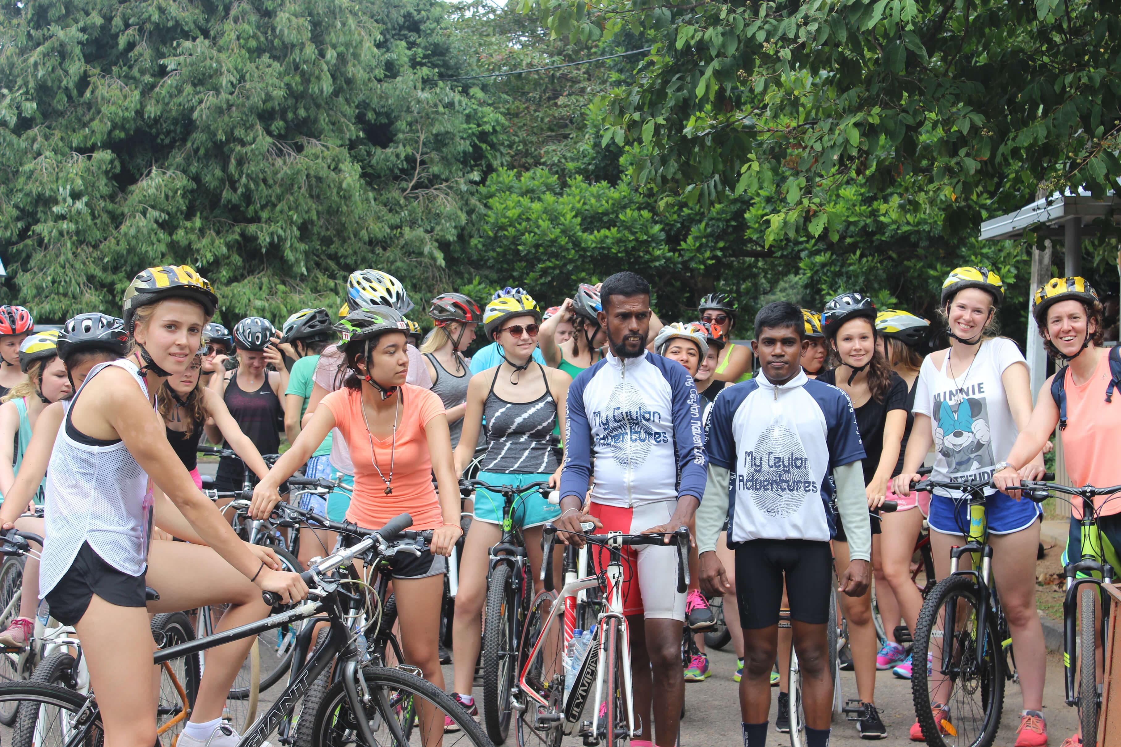 A group of tourists getting ready to start the cycle tour in countryside Colombo, Sri Lanka.