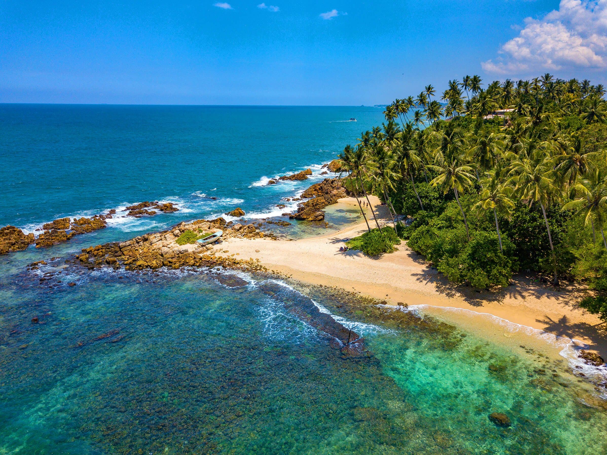 Aerial view of secret beach in tropical paradise Mirissa, Sri Lanka.